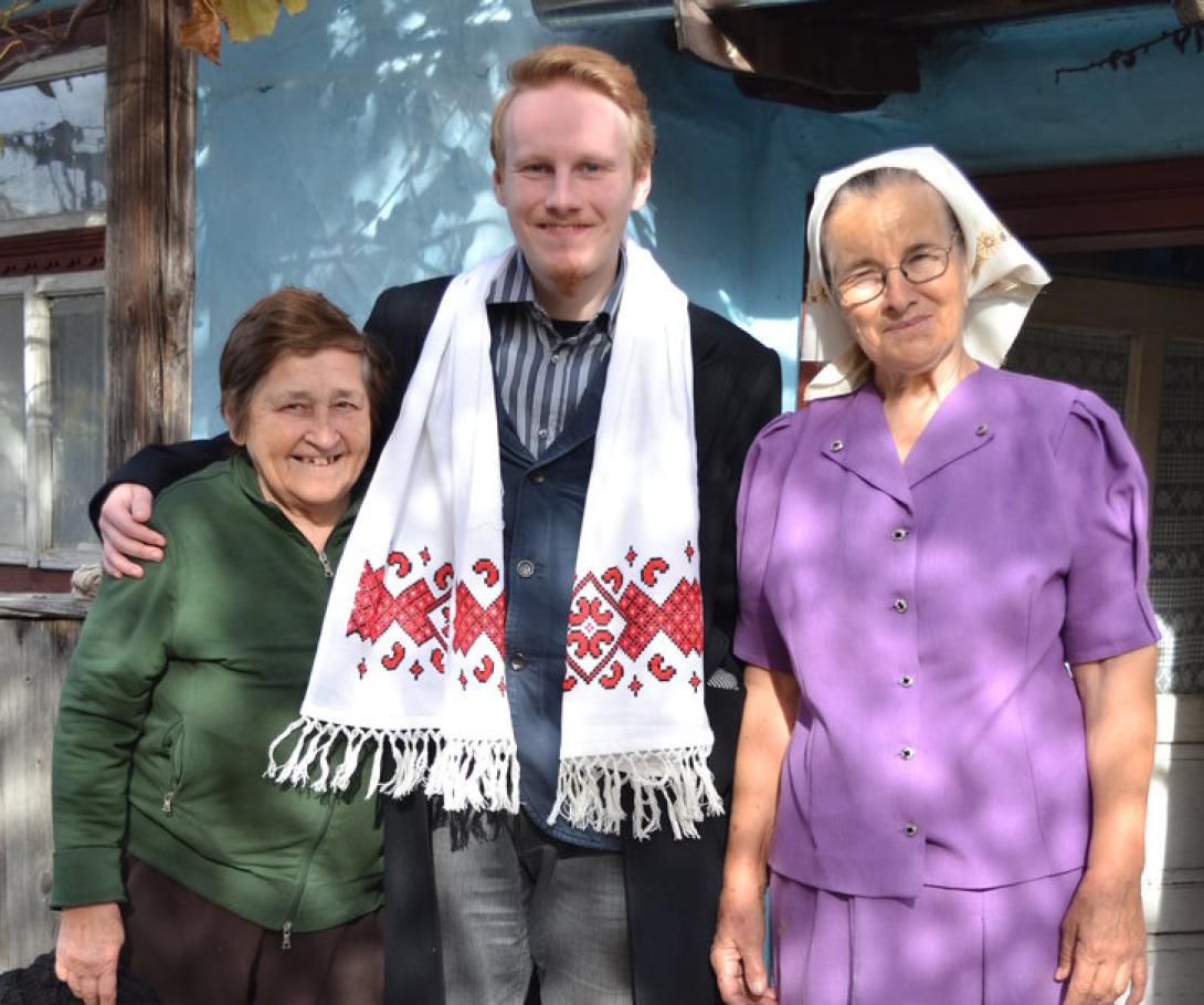 Projects Abroad volunteer in Romania interacting with local women.